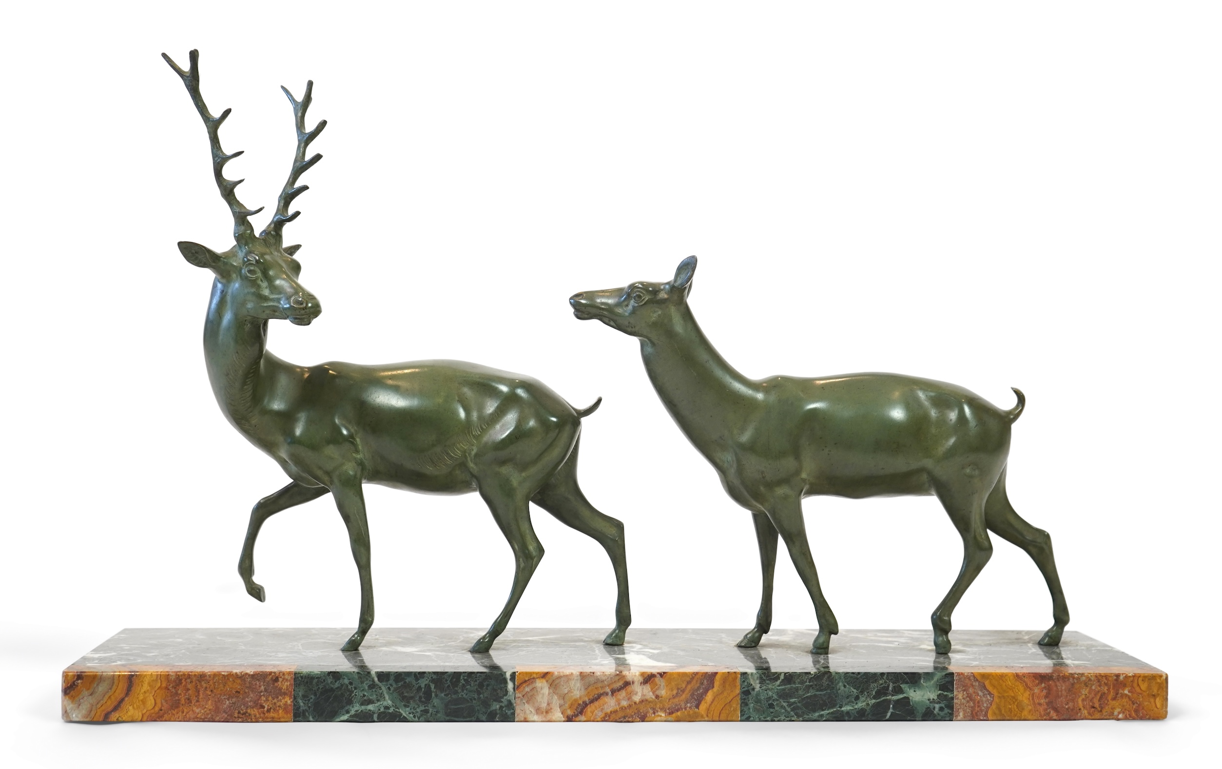 Manner of Louis-Albert Carvin, French 1875-1951, An Art Deco bronze group of a stag and doe